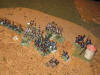 The surprised grenadiers do not form the square and must to fall back in front of the Spanish cavalry...