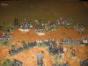 ...  while maintain a firing duel with the Spanish infantry and artillery deployed in the centre